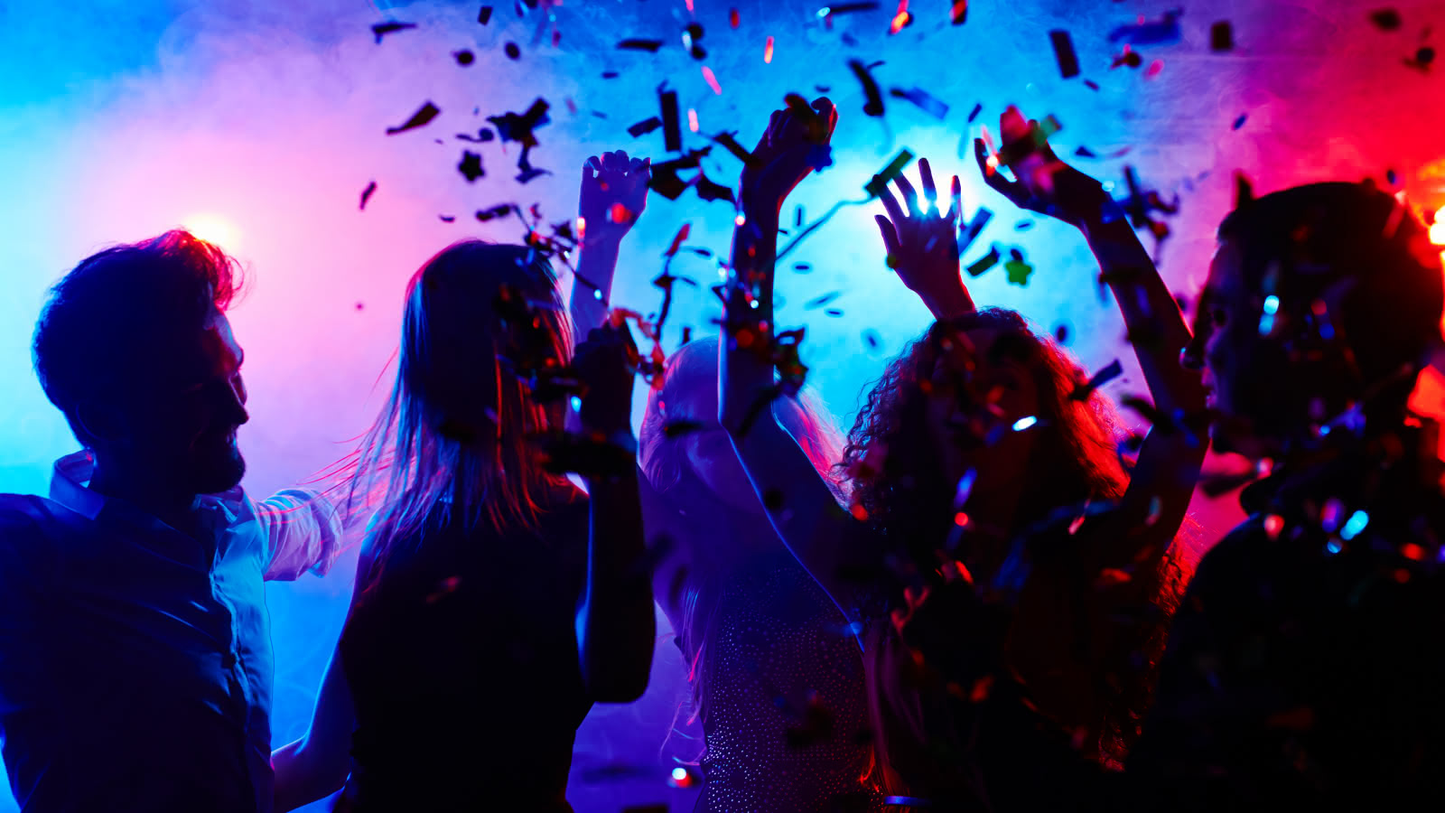 people celebrating the new year in a club